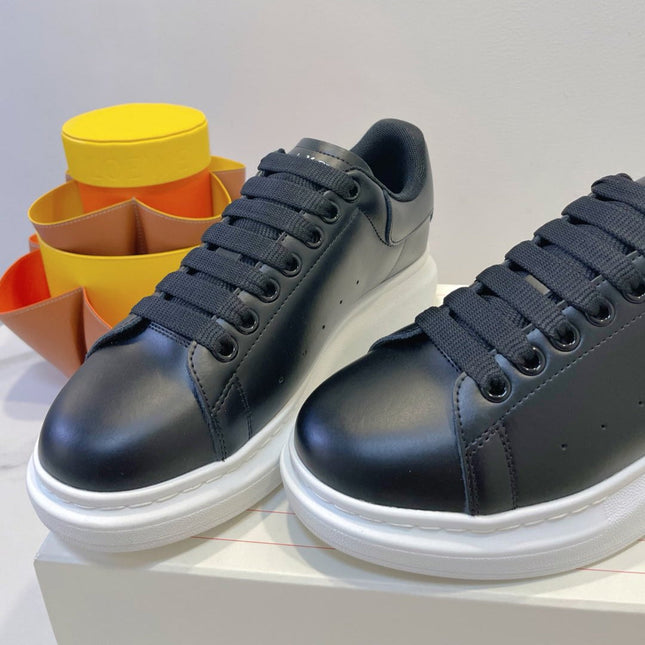 OVERSIZED SNEAKERS IN BLACK SMOOTH CALFSKIN WITH BLACK HEEL DETAIL