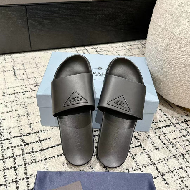 PRADA 25S RUBBER SLIDE IN CHARCOAL CALFSKIN WITH LOGO