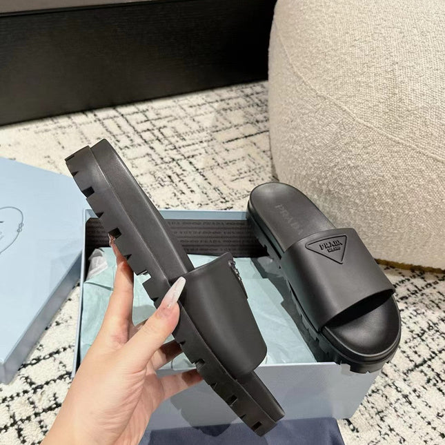 PRADA 25S RUBBER SLIDE IN CHARCOAL CALFSKIN WITH LOGO