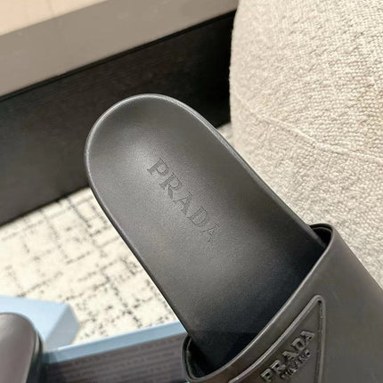 PRADA 25S RUBBER SLIDE IN CHARCOAL CALFSKIN WITH LOGO