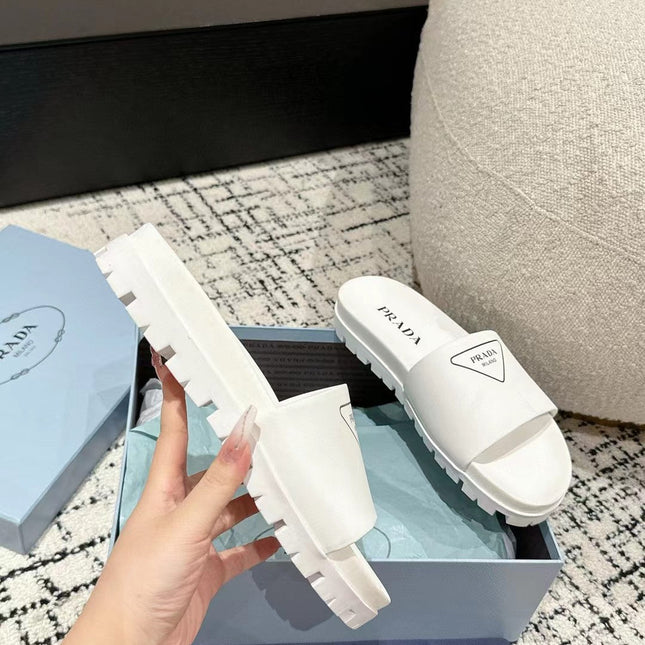 PRADA 25S RUBBER SLIDE IN WHITE CALFSKIN WITH LOGO