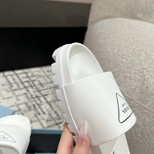 PRADA 25S RUBBER SLIDE IN WHITE CALFSKIN WITH LOGO