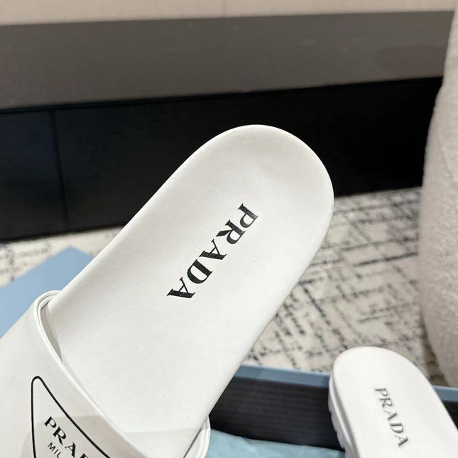 PRADA 25S RUBBER SLIDE IN WHITE CALFSKIN WITH LOGO