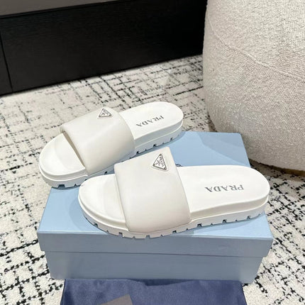 PRADA 25S PADDED SLIDES IN WHITE CALFSKIN WITH LOGO