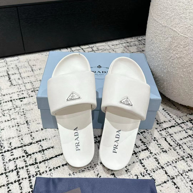 PRADA 25S PADDED SLIDES IN WHITE CALFSKIN WITH LOGO