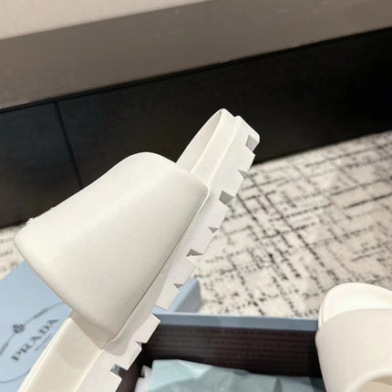 PRADA 25S PADDED SLIDES IN WHITE CALFSKIN WITH LOGO
