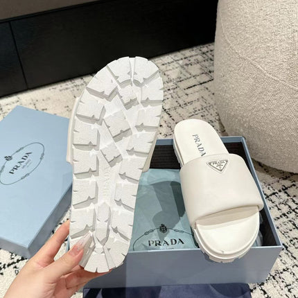 PRADA 25S PADDED SLIDES IN WHITE CALFSKIN WITH LOGO