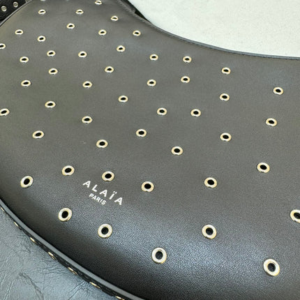 ONE PIECE DEMI LUNE BAG 31 IN BLACK SHEEPSKIN EYELET DETAILING