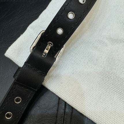ONE PIECE DEMI LUNE BAG 31 IN BLACK SHEEPSKIN EYELET DETAILING