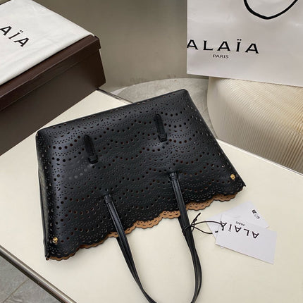 MINA 32 BAG IN BLACK VIENNA WAVE CALFSKIN