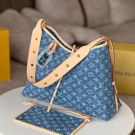LV 25S CARRYALL 39 IN BLUE DENIM MONOGRAM LEATHER TRIM