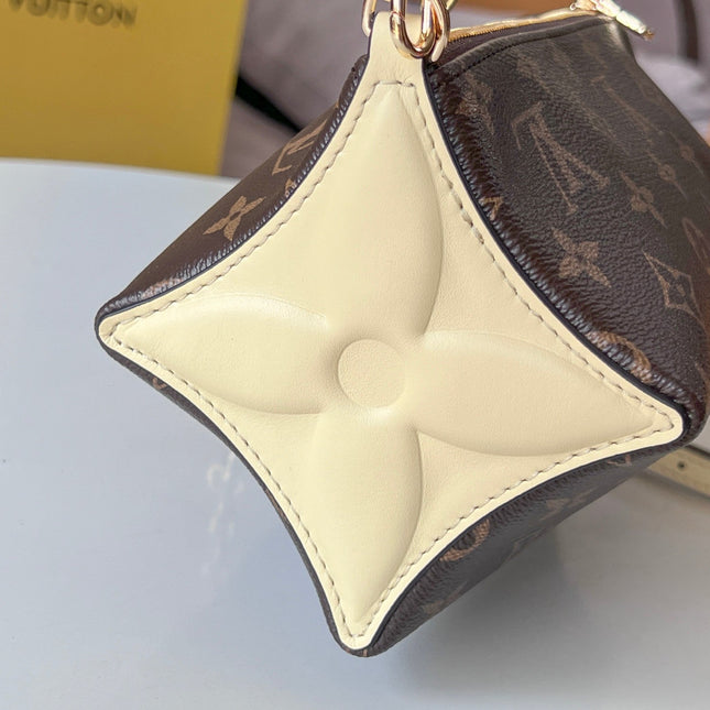 BLOOM POUCH 22 IN BROWN MONOGRAM CANVAS AND PASTEL YELLOW CALFSKIN SIDES