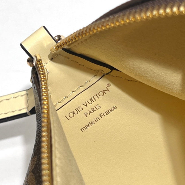 BLOOM POUCH 22 IN BROWN MONOGRAM CANVAS AND PASTEL YELLOW CALFSKIN SIDES