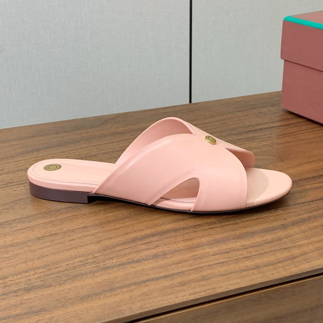 FLAT SLIPPERS IN LIGHT PINK CALFSKIN