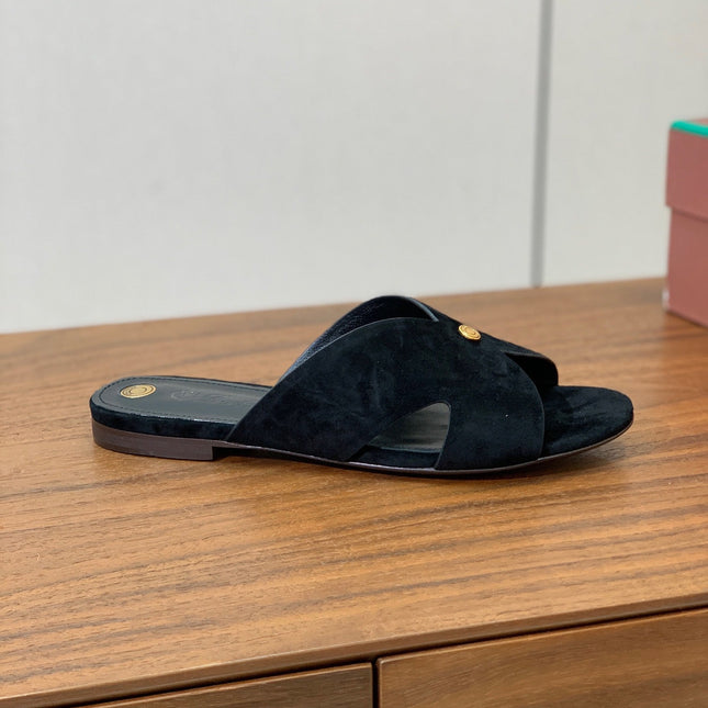 FLAT SLIPPERS IN BLACK SUEDE