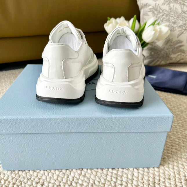 PRA THICK SOLE SNEAKER WHITE AND BLACK LOGO CALFSKIN