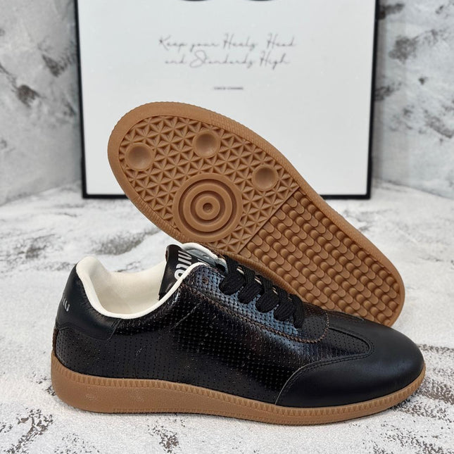 RETRO SNEAKERS IN BLACK LAMBSKIN WITH KNITTED PATTERN