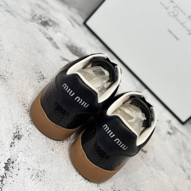 RETRO SNEAKERS IN BLACK LAMBSKIN WITH KNITTED PATTERN