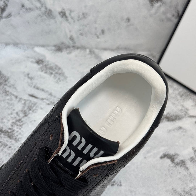 RETRO SNEAKERS IN BLACK LAMBSKIN WITH KNITTED PATTERN