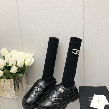 CHUNKY PLATFORM SHEARLING SLIPPER BLACK LAMBSKIN