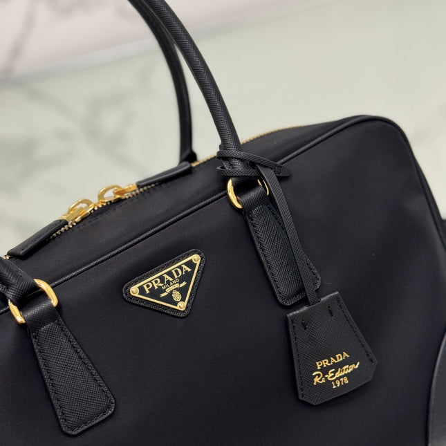 LARGE TOP HANDLE BAG 35 IN BLACK NYLON AND CALFSKIN TRIM