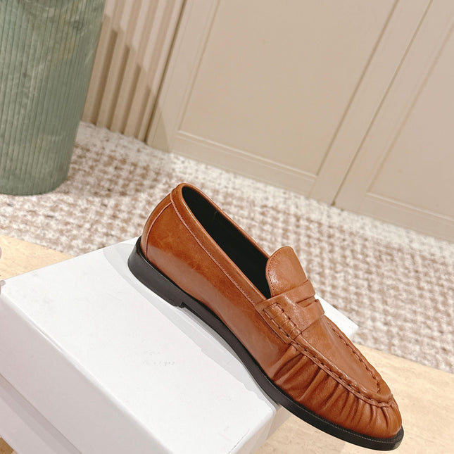 YSL 25S SAINT LAURENT LOAFERS IN BURNT ORANGE CALFSKIN WITH SMALL LOGO
