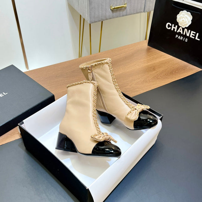 CHANEL 25S HEELED CHAIN BOOTS WITH BOW IN BEIGE CALFSKIN GOLD HARDWRE