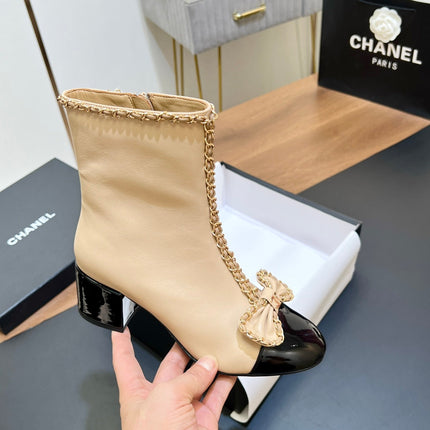 CHANEL 25S HEELED CHAIN BOOTS WITH BOW IN BEIGE CALFSKIN GOLD HARDWRE