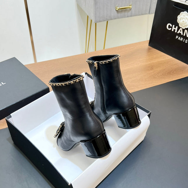 CHANEL 25S HEELED CHAIN BOOTS WITH BOW IN BLACK CALFSKIN GOLD HARDWRE