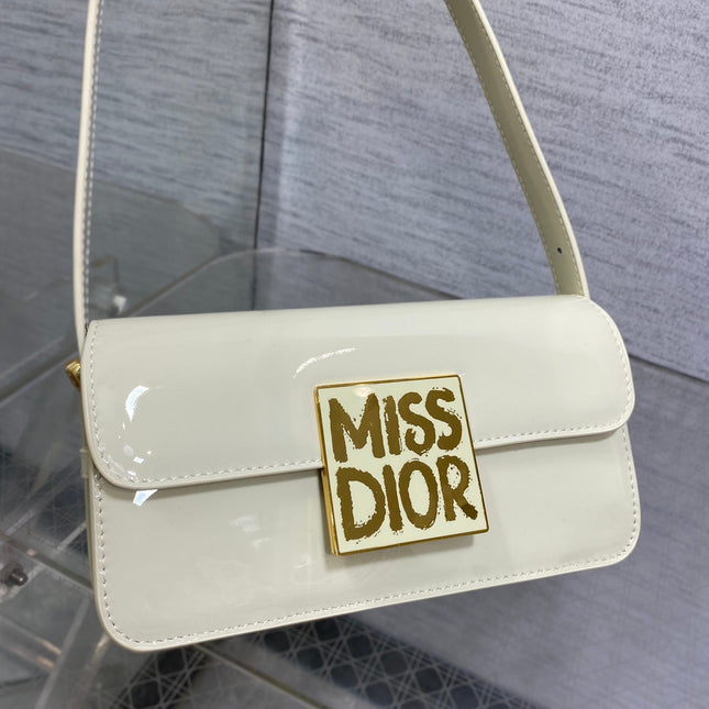 FLAP BAG 18 IN WHITE PATENT CALFSKIN