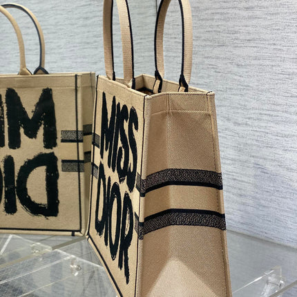 LARGE BOOK TOTE 42 BEIGE AND BLACK MISS DIOR GRAFFITI EMBROIDERY