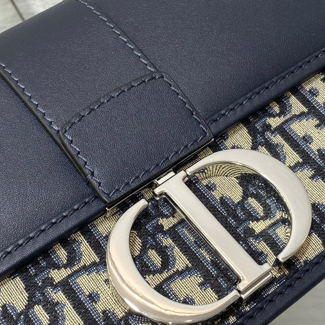 MONTAIGNE EAST-WEST 25 BAG WITH CHAIN IN NAVY BLUE LAMBSKIN AND MONOGRAM JACQUARD