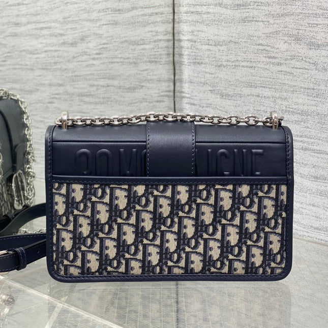 MONTAIGNE EAST-WEST 25 BAG WITH CHAIN IN NAVY BLUE LAMBSKIN AND MONOGRAM JACQUARD