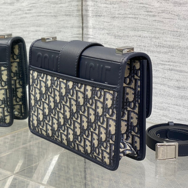 MONTAIGNE EAST-WEST 24 BAG WITH CHAIN IN NAVY BLUE LAMBSKIN AND MONOGRAM JACQUARD