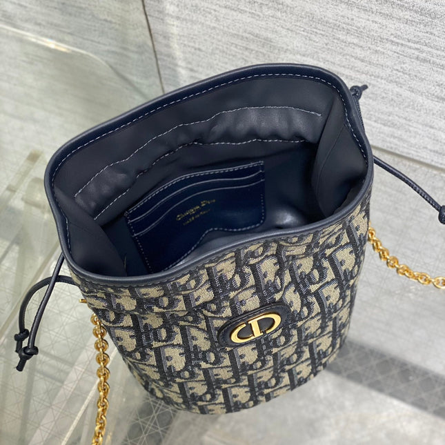 MONTAIGNE MINI 18 BUCKET BAG WITH DRAWSTRING IN BLUE OBLIQUE JACQUARD
