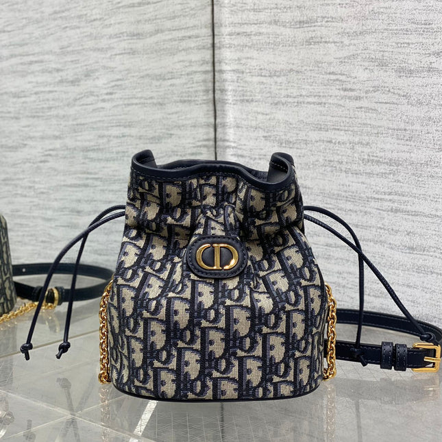 MONTAIGNE MINI 18 BUCKET BAG WITH DRAWSTRING IN BLUE OBLIQUE JACQUARD
