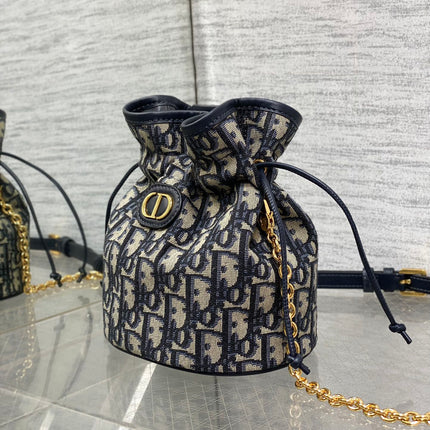 MONTAIGNE MINI 18 BUCKET BAG WITH DRAWSTRING IN BLUE OBLIQUE JACQUARD