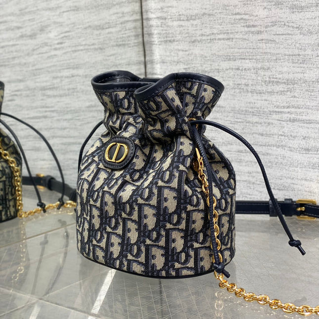 MONTAIGNE MINI 18 BUCKET BAG WITH DRAWSTRING IN BLUE OBLIQUE JACQUARD