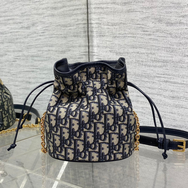 MONTAIGNE MINI 18 BUCKET BAG WITH DRAWSTRING IN BLUE OBLIQUE JACQUARD