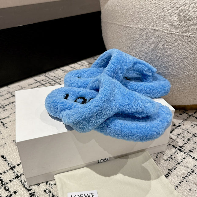 LW SHEARLING THONG SLIPPER IN LAPIS