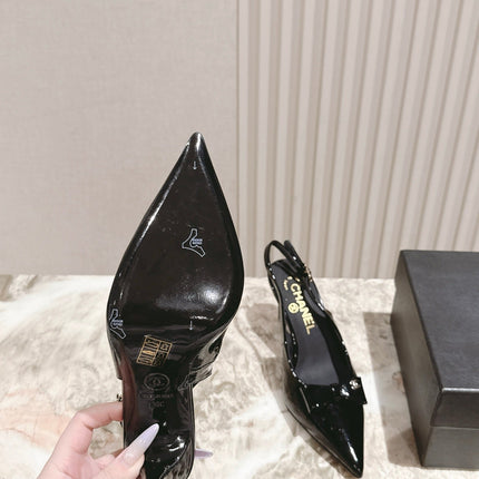 CC HIGH SLINGBACK IN BLACK LAMBSKIN WITH BOW ATTACHED
