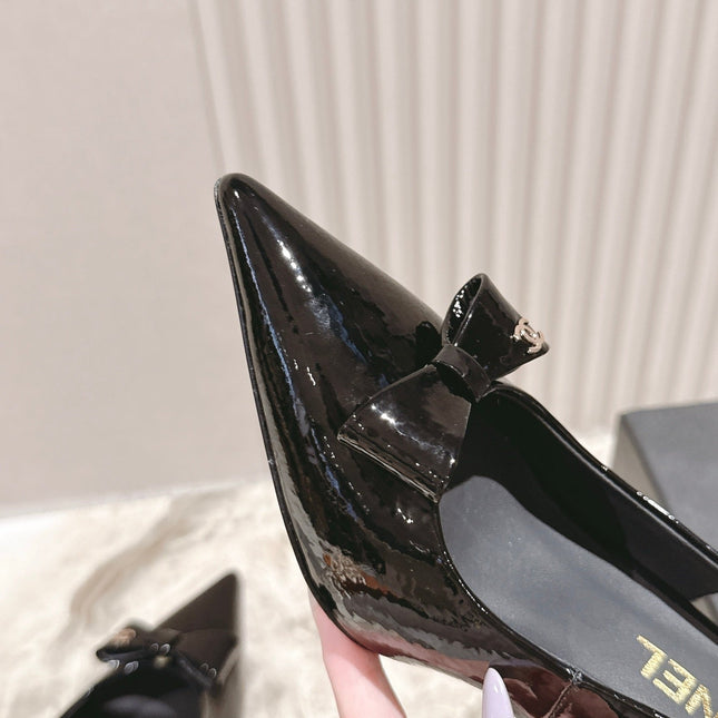 CC HIGH SLINGBACK IN BLACK LAMBSKIN WITH BOW ATTACHED