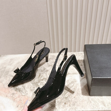 CC HIGH SLINGBACK IN BLACK LAMBSKIN WITH BOW ATTACHED