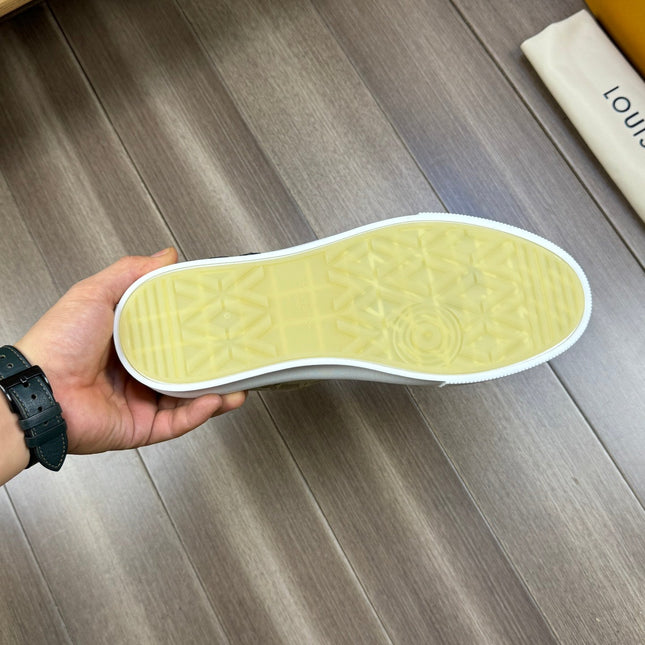 LV TRAINER SNEAKER IN OLIVE YELLOW MONOGRAM DENIM