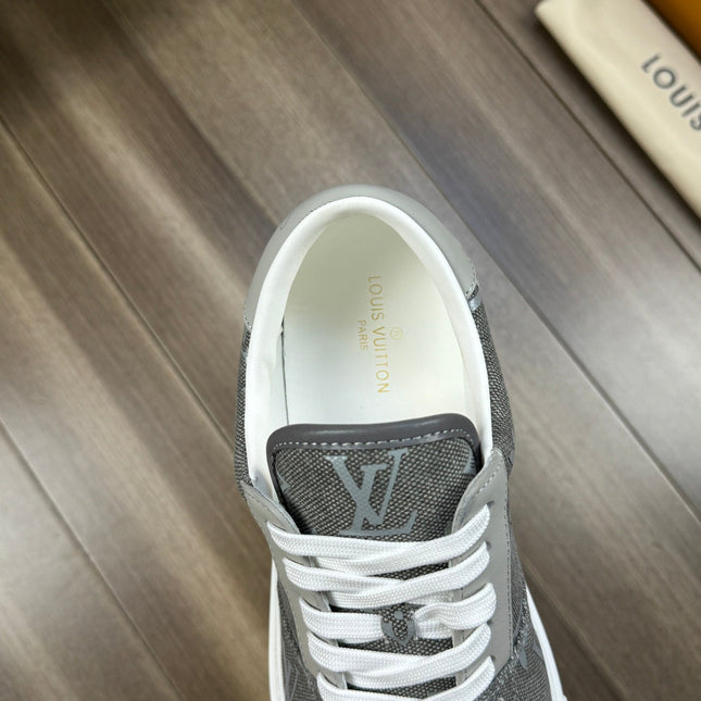 LV TRAINER SNEAKER IN GREY PASTEL MONOGRAM DENIM
