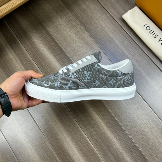 LV TRAINER SNEAKER IN GREY PASTEL MONOGRAM DENIM