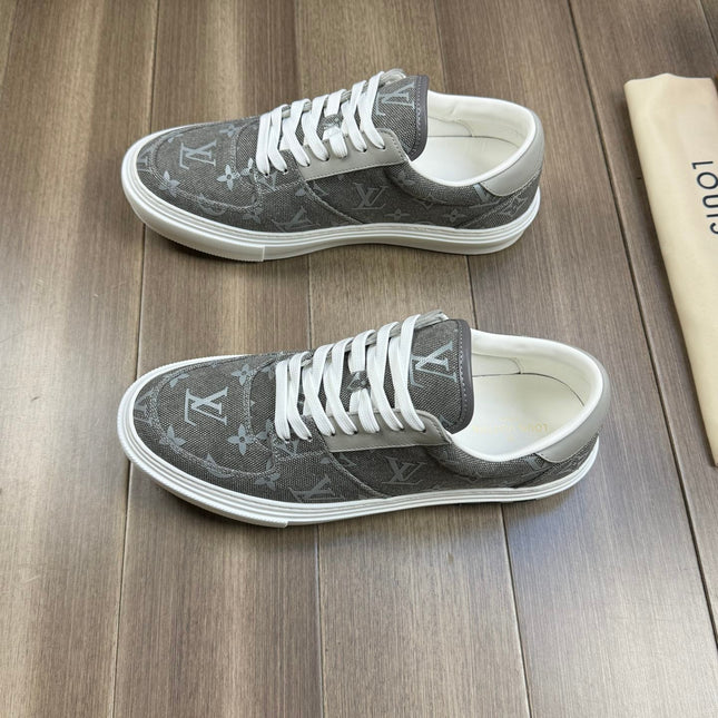 LV TRAINER SNEAKER IN GREY PASTEL MONOGRAM DENIM