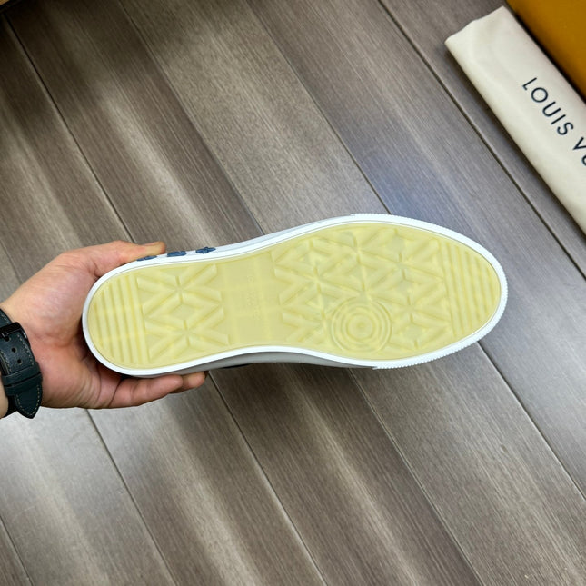 LV TRAINER SNEAKER IN BLACK AND BLUE MONOGRAM DENIM
