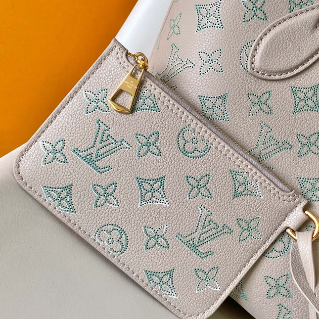 BLOSSOM 20 IN LIGHT BEIGE MAHINA CALFSKIN