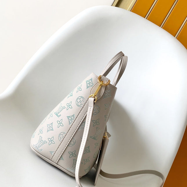 BLOSSOM 20 IN LIGHT BEIGE MAHINA CALFSKIN